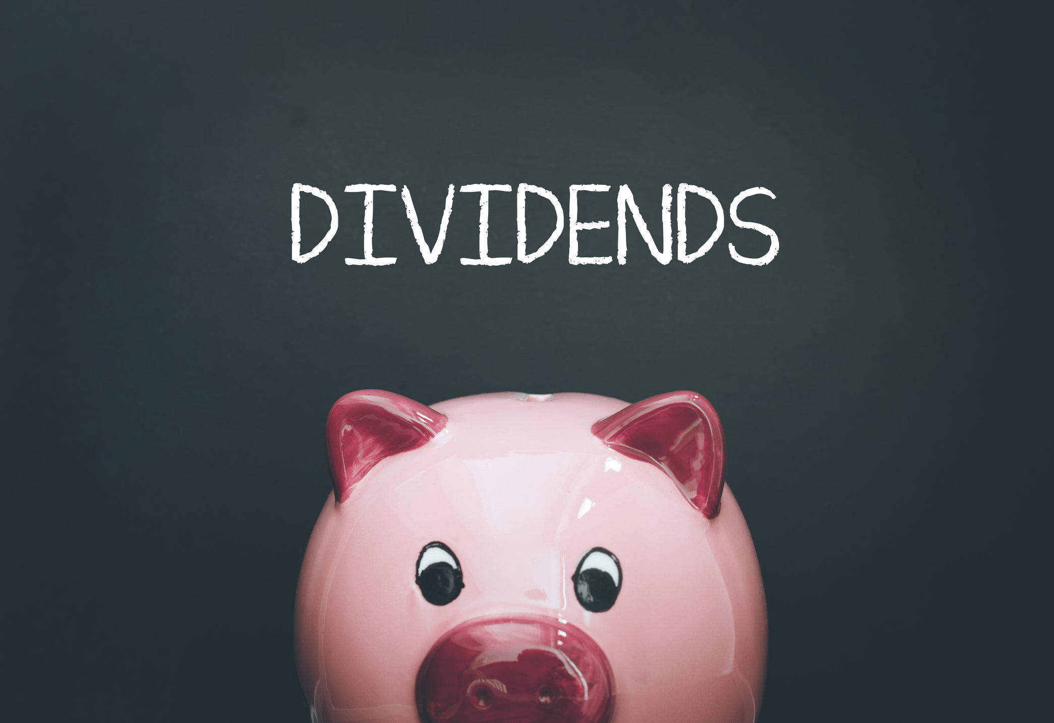 Das Wort Dividends und Sparschwein